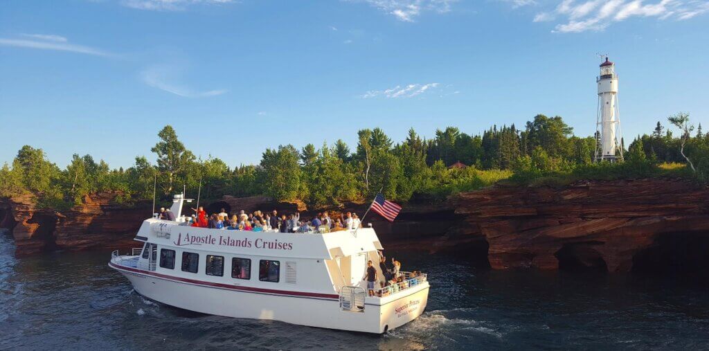 Apostle Islands Cruises passes a lighthouse