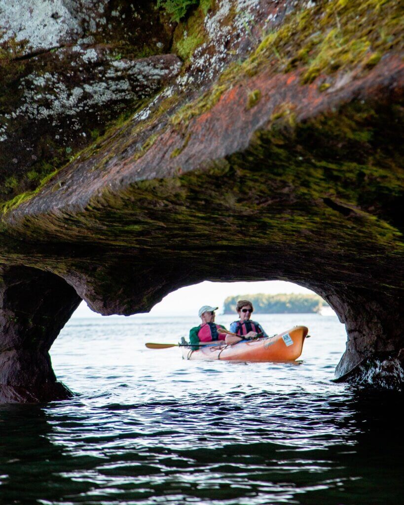 Kayak through sea caves in Apostle Islands