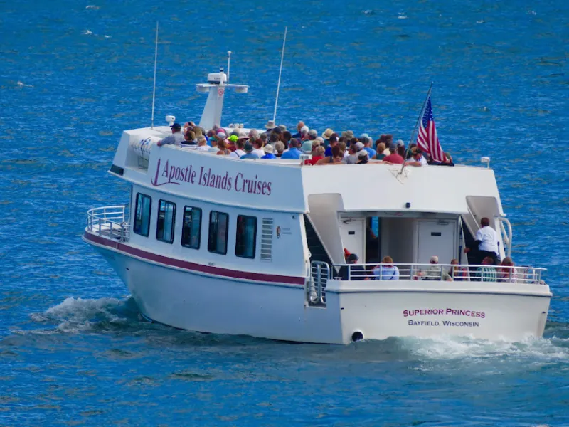 Michigan Island's twin, white lighthouses. One is tall on the left while the other is shorter on the right.