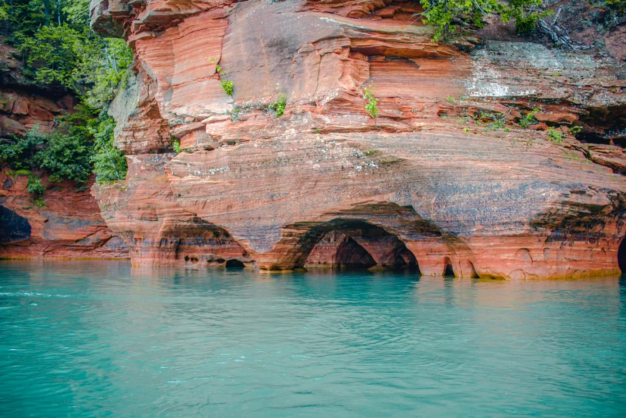 Devils Island Red Sandstone Caves and Turquoise Waters